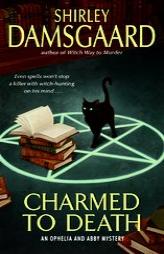 Charmed to Death: An Ophelia and Abby Mystery (Ophelia and Abby Mysteries) by Shirley Damsgaard Paperback Book