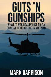 Guts 'N Gunships: What it was Really Like to Fly Combat Helicopters in Vietnam by Mark Garrison Paperback Book