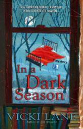 In a Dark Season by Vicki Lane Paperback Book