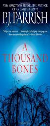 A Thousand Bones by P. J. Parrish Paperback Book